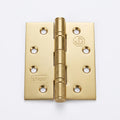 A pair of brass cabinet hinges with six mounting holes on each leaf, shown on a plain white background.