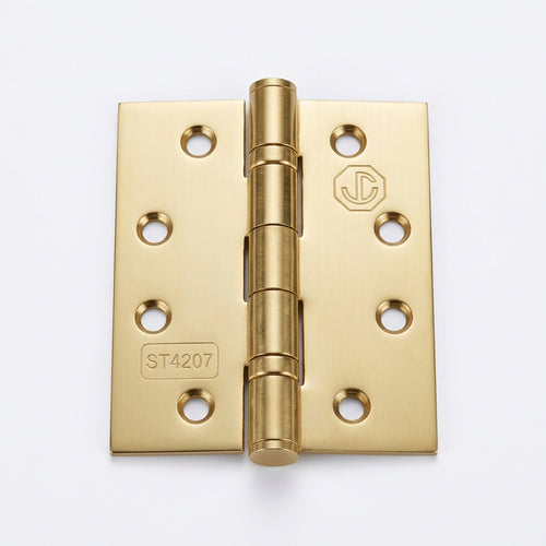 A pair of brass cabinet hinges with six mounting holes on each leaf, shown on a plain white background.